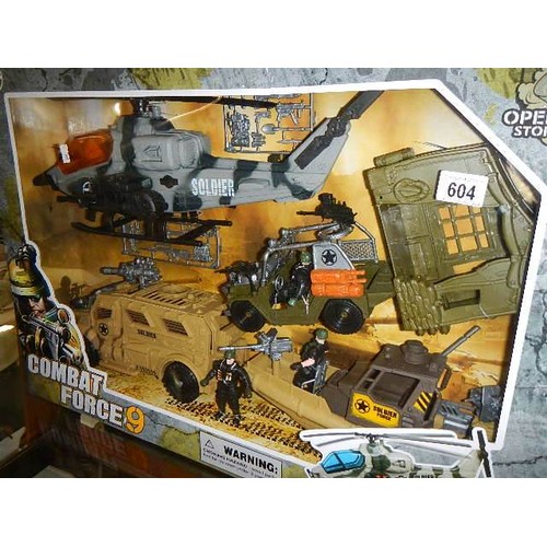 604 - A sealed boxed Combat Force 9 military play set. COLLECT ONLY.