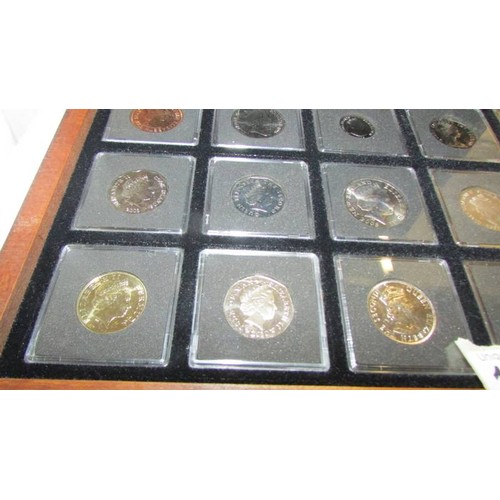 1196 - A cased set of Elizabeth II coins.