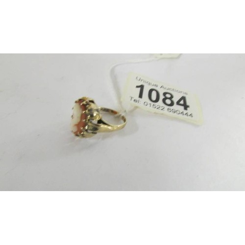 1084 - A vintage 9ct gold cameo ring set with a female profile, size J. 3.7 grams.