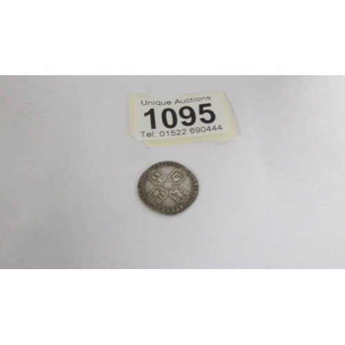 1095 - A 1758 George III silver sixpence.