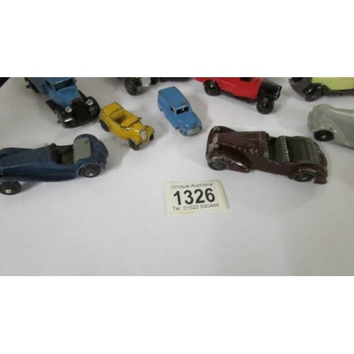 1326 - A selection of post war Dinky toys including 25 series lorries, Austin Seven, Vauxhall etc.,