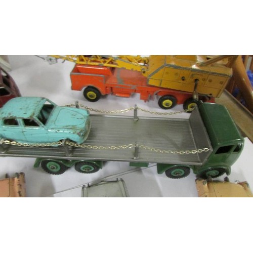 1327 - A selection of Dinky toys including Foden, Bedford, Mini, Cadillac etc.,