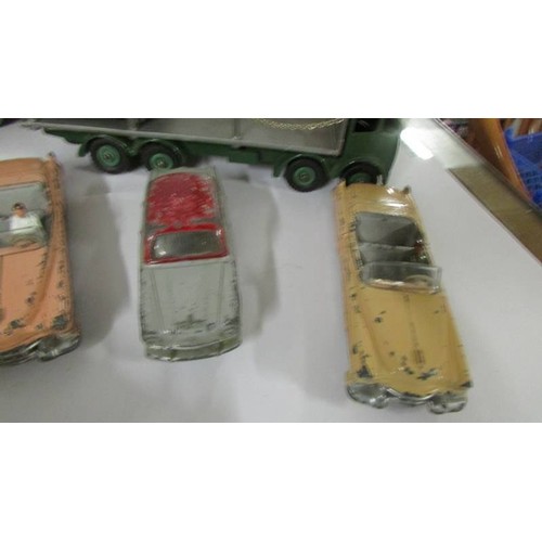 1327 - A selection of Dinky toys including Foden, Bedford, Mini, Cadillac etc.,