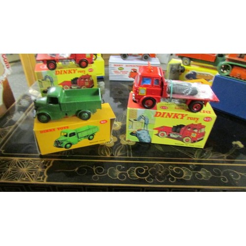 1333 - A selection of Playworn Dinky commercial vehicles in reproduction boxes.