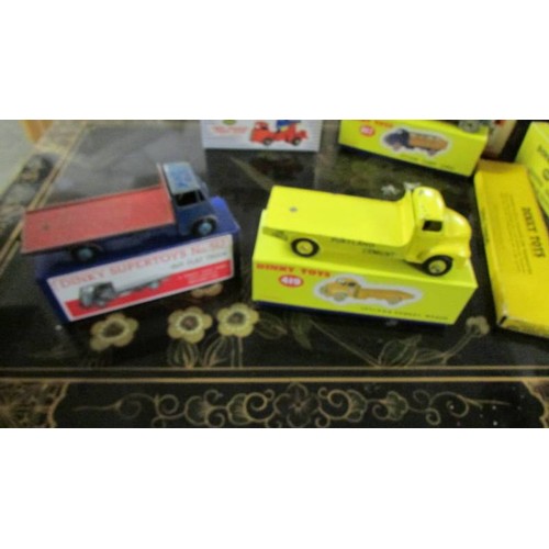 1333 - A selection of Playworn Dinky commercial vehicles in reproduction boxes.