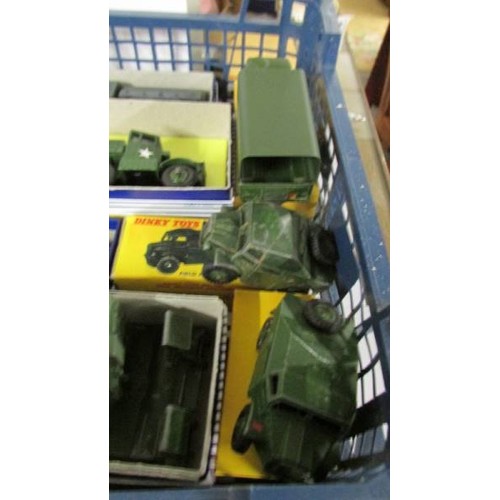 1340 - Thirteen Dinky military vehicles, twelve in reproduction boxes.