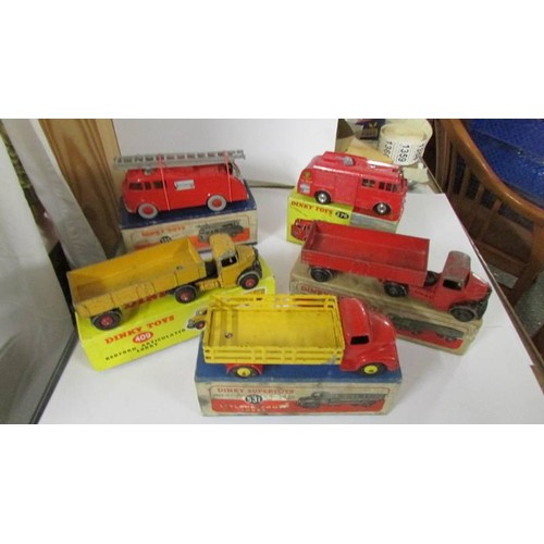 1352 - Three Playworn Dinky Bedford Leyland and two fire engines in original boxes.  276, 521, 531, 555, 40... 