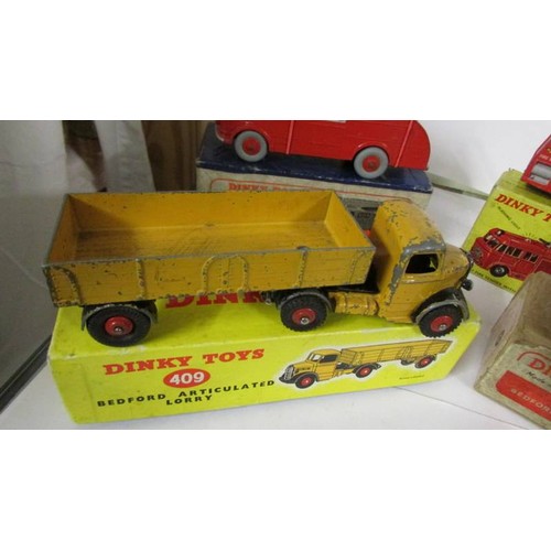 1352 - Three Playworn Dinky Bedford Leyland and two fire engines in original boxes.  276, 521, 531, 555, 40... 