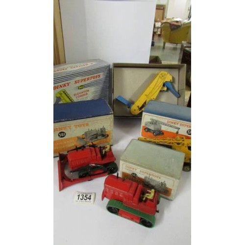 1354 - Four boxed Dinky:- 561, 563, 571, 964, bulldozer, crane, heavy tractor and elevator loader in origin... 