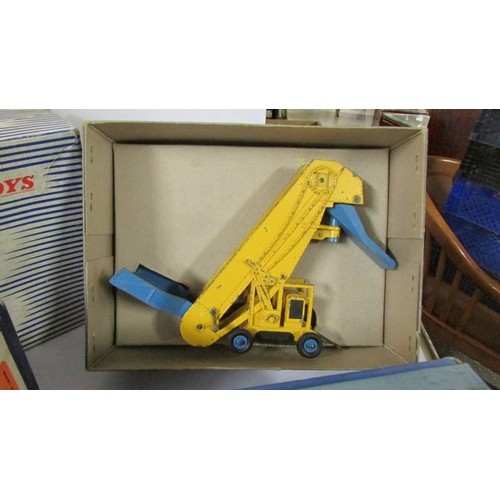 1354 - Four boxed Dinky:- 561, 563, 571, 964, bulldozer, crane, heavy tractor and elevator loader in origin... 