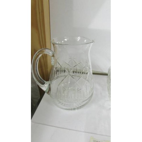 1361 - A cut glass biscuit jar and a cut glass jug.