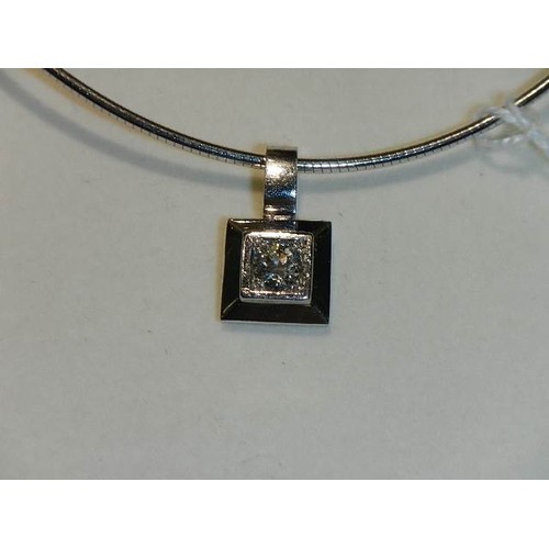 1109 - An 18ct white gold and +1 ct diamond pendant (17 grams)