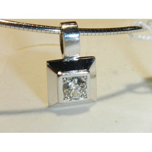 1109 - An 18ct white gold and +1 ct diamond pendant (17 grams)