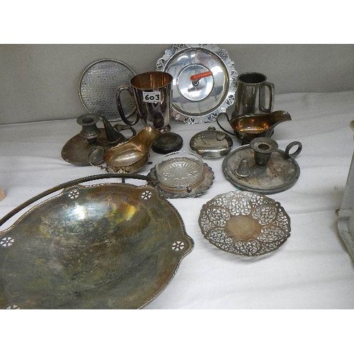 603 - A mixed lot of silver plate and a silver dressing table pot top.