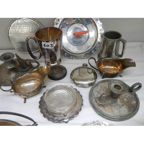 603 - A mixed lot of silver plate and a silver dressing table pot top.