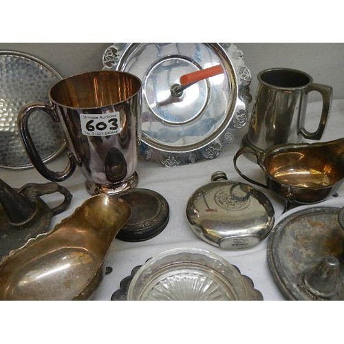 603 - A mixed lot of silver plate and a silver dressing table pot top.