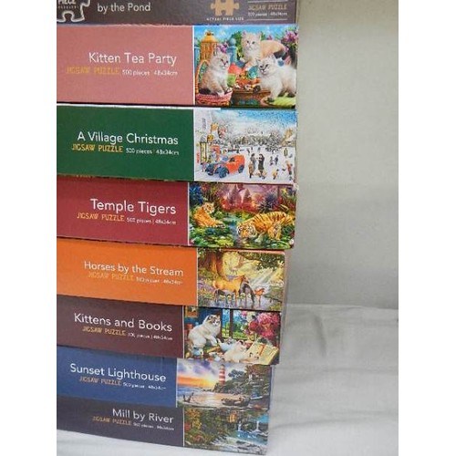 605 - Eight jigsaw puzzles, complete in bags.