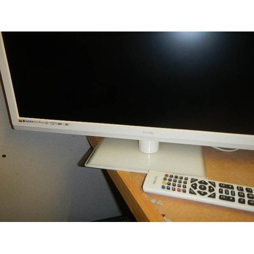 606 - A white flat screen television.  COLLECT ONLY.