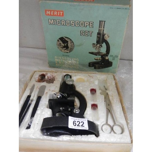 622 - A circa 1950's Merit student microscope.