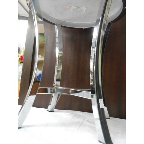 634 - A mid to late 20th-century chrome stool with white seat.  COLLECT ONLY.