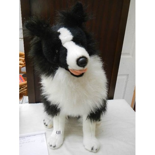 635 - A toy Border Collie dog.