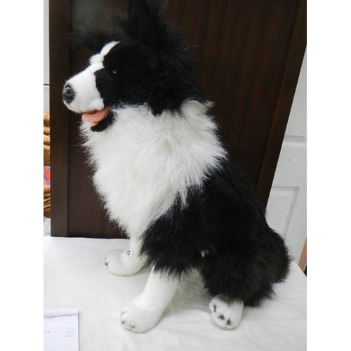 635 - A toy Border Collie dog.