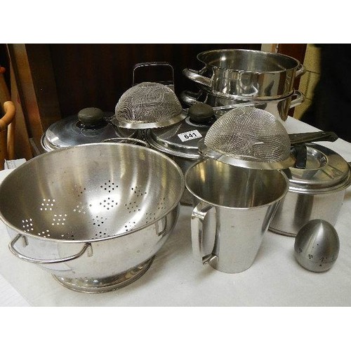 641 - A mixed lot of stainless steel pans, colander etc.,  COLLECT ONLY.