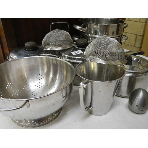 641 - A mixed lot of stainless steel pans, colander etc.,  COLLECT ONLY.