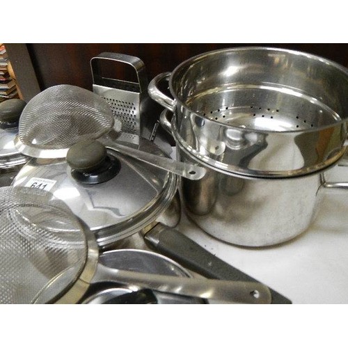 641 - A mixed lot of stainless steel pans, colander etc.,  COLLECT ONLY.