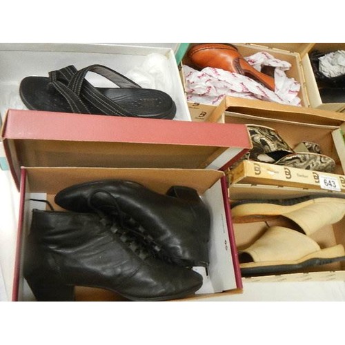 643 - Eight pairs of previously worn shoes in boxes.