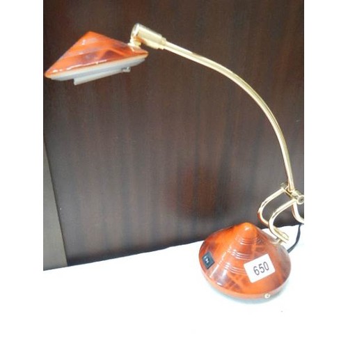 650 - An adjustable reading lamp.