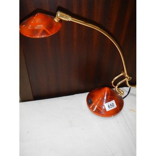 650 - An adjustable reading lamp.