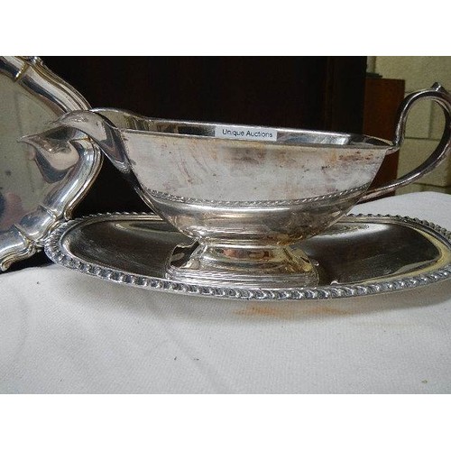 652 - A good circa 1970's gravy boat on tray with a spare tray.