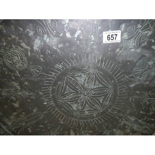 657 - A large silver plate on copper Indian tray (plate badly worn). COLLECT ONLY.