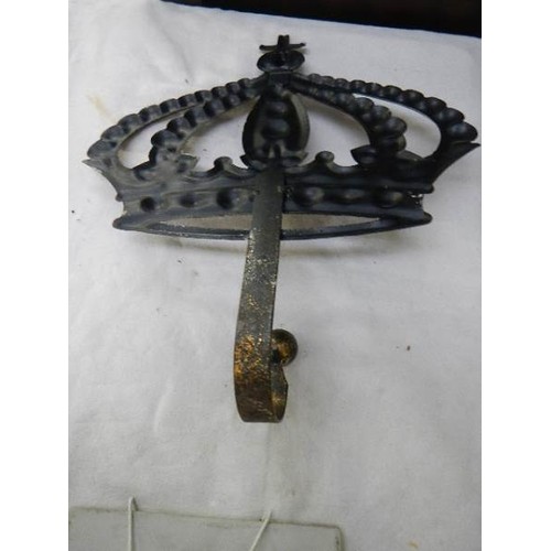 665 - A metal hook in the form of a crown and a Danish armorial tile.