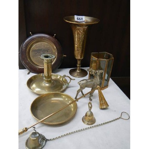 668 - A mixed lot of brassware including chamber candlestick, vase, candlesnuffer etc.,