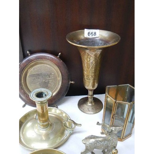 668 - A mixed lot of brassware including chamber candlestick, vase, candlesnuffer etc.,