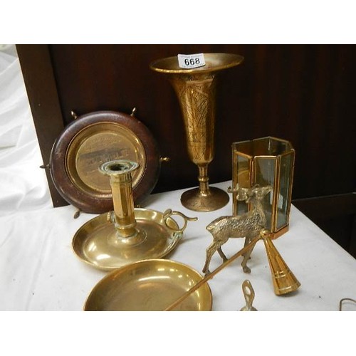 668 - A mixed lot of brassware including chamber candlestick, vase, candlesnuffer etc.,