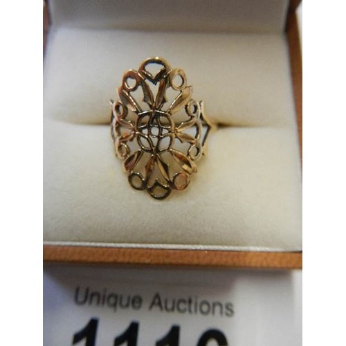 1116 - A pretty 9ct gold filigree ring, size N.  2 grams.