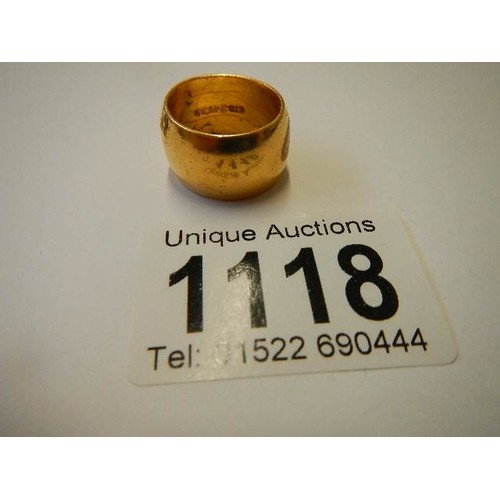 1118 - A wide 22ct gold wedding ring, size K. 14 grams.