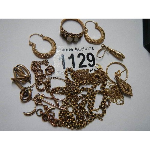 1129 - Approximately 16 grams of scrap gold.