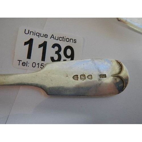 1139 - A pair of hall marked silver sauce ladles, 164 grams.