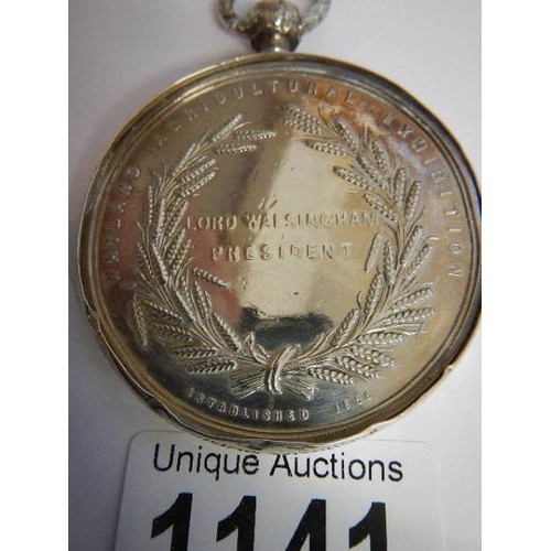 1141 - A large heavy silver medalion 'Lord Walsingham, President, 1856', 72 grams.