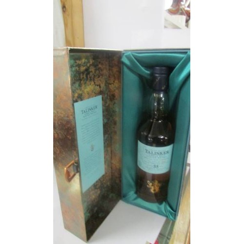 1383 - A boxed limited edition Talsiter single malt, aged 35 years, bottle No. 2647 of 3000 & a gift pack o... 