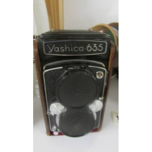 1393 - A vintage Yashica 635 camera and a Lubitel Universal 166 camera.