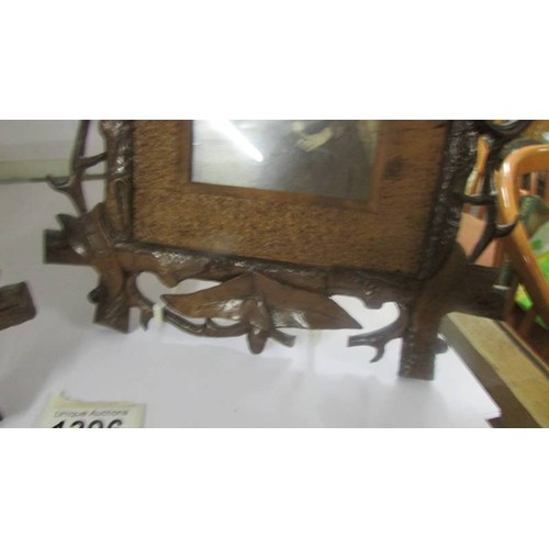 1396 - A pair of 19th-century carved wood photograph frames (1 a/f).