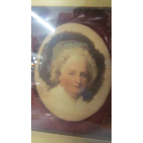 1400 - A pair of framed and glazed miniature portraits of George and Martha Washington.