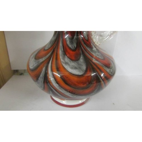 1403 - A 1970's Murano glass jug by Carlos Moretti, 23.5 cm tall.