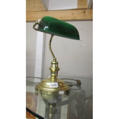 1440 - A good quality brass bankers lamp with green glass shade. COLLECT ONLY.