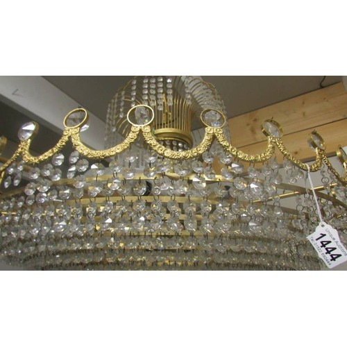 1444 - A large glass and gilt chandelier.  COLLECT ONLY.